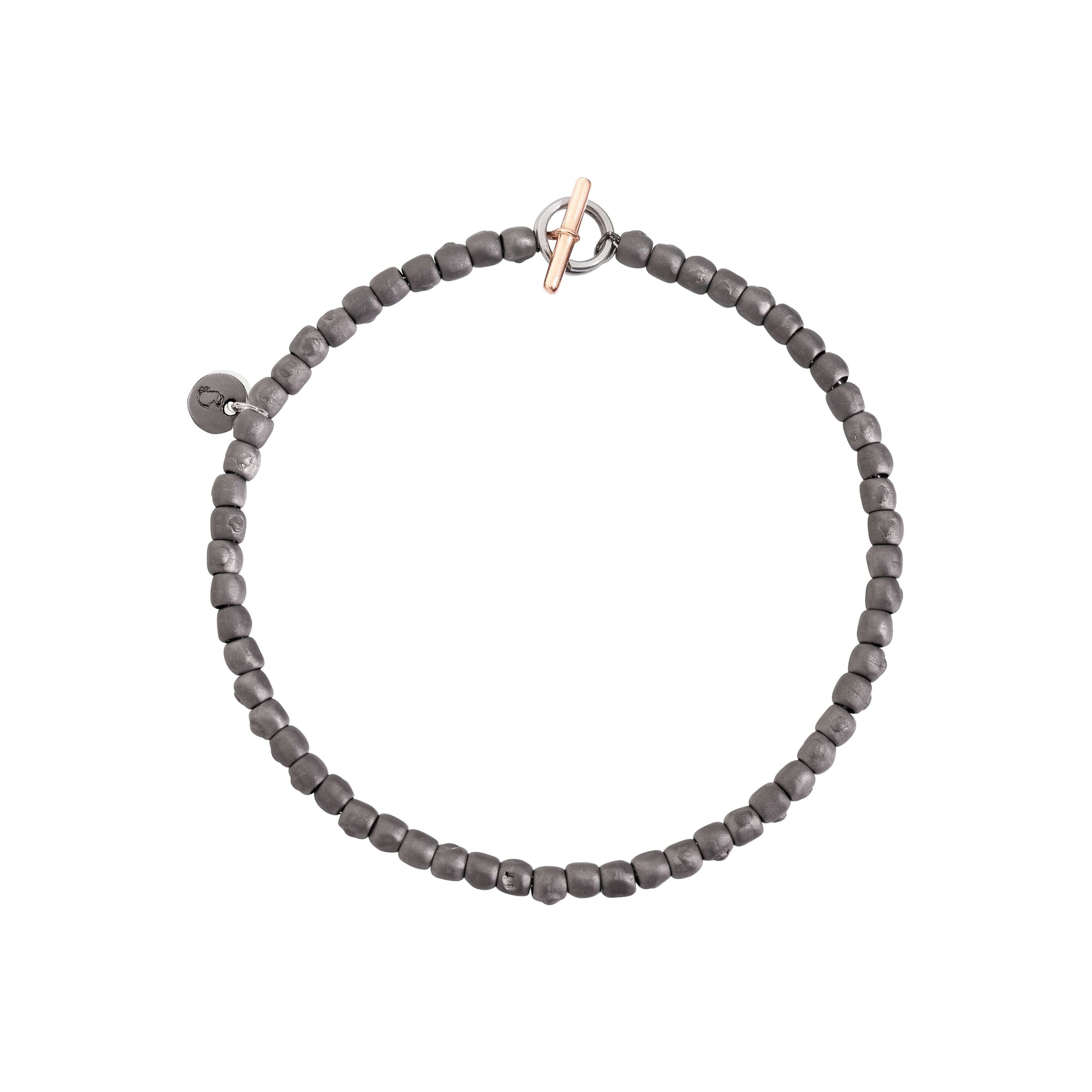 Mini granelli bracelet in titanium, chain and brisè ring closure in steel, t-bar in 9K rose gold, plaquettes in titanium and steel  - Rose Gold & Titanium